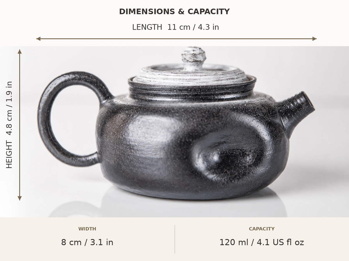Dimensions of a black ceramic teapot showing 11 cm length, 8 cm width, 4.8 cm height and 120 ml capacity