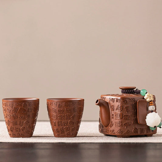 Bai Fu square purple clay teapot with two matching relief teacups
