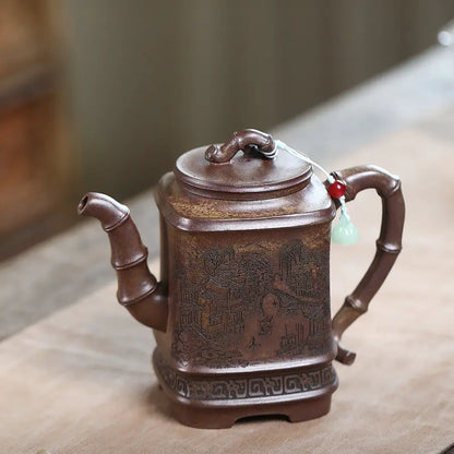 Square Yixing zisha teapot with bamboo-style spout and handle, Jiangnan water-town carving, and decorative lid cord