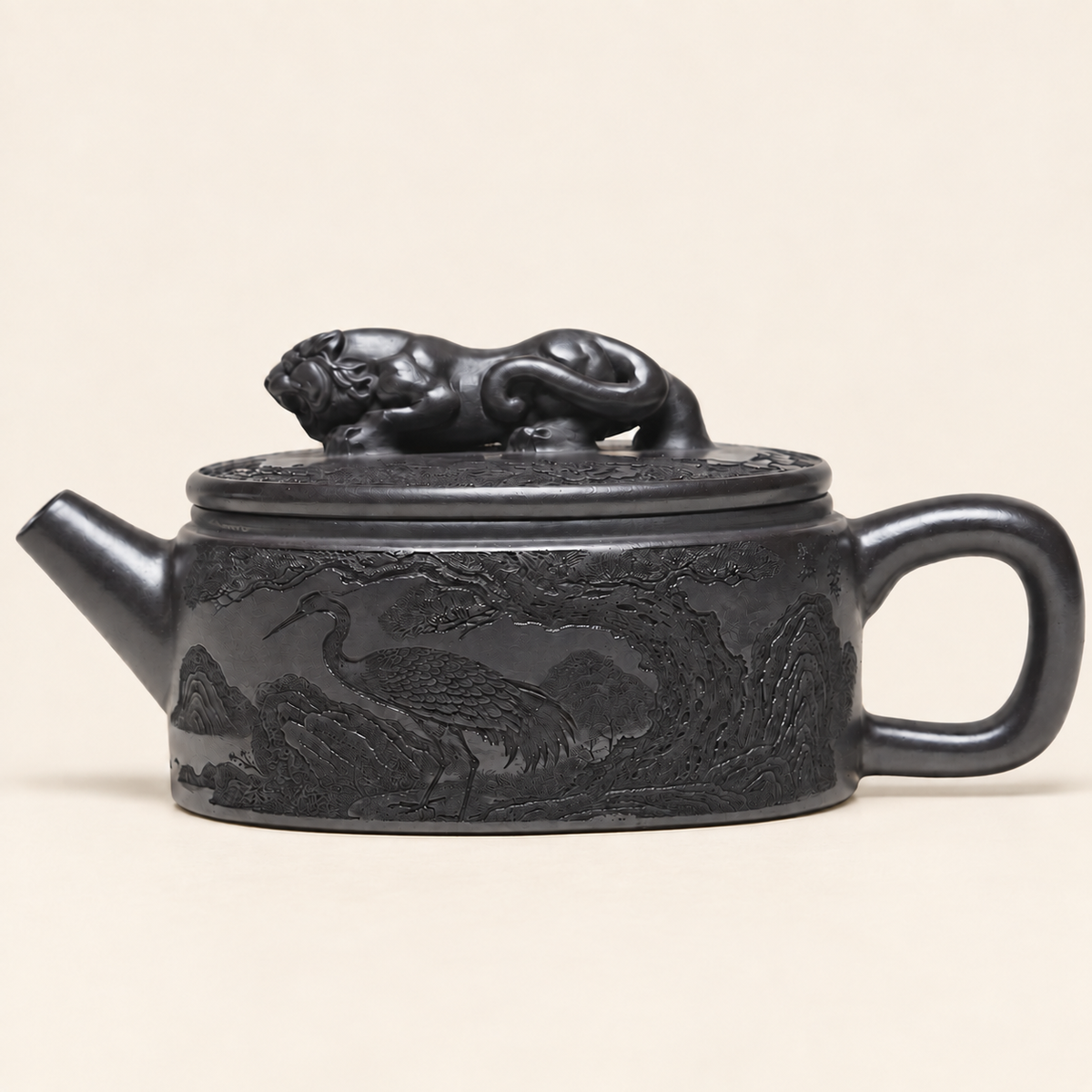 Handmade dark Yixing zisha teapot with a sculpted tiger knob and crane landscape carving on a white background