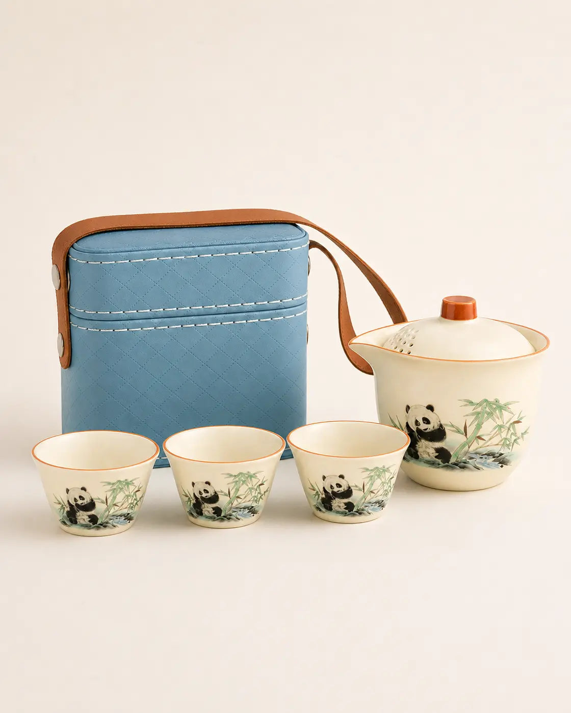 Short-trip panda ceramic tea set with teapot, three cups and light blue square carrying case