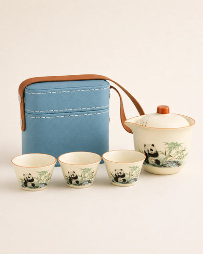 Short-trip panda ceramic tea set with teapot, three cups and light blue square carrying case