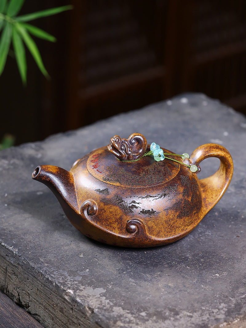 Three-quarter view of the wood-fired Yixing zisha teapot showing the carved lid, low body, spout, and handle
