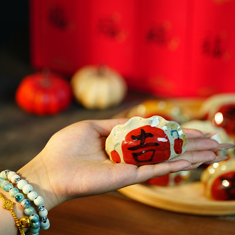 Hand-Painted Good Fortune Ceramic Pebble Set - detail texture