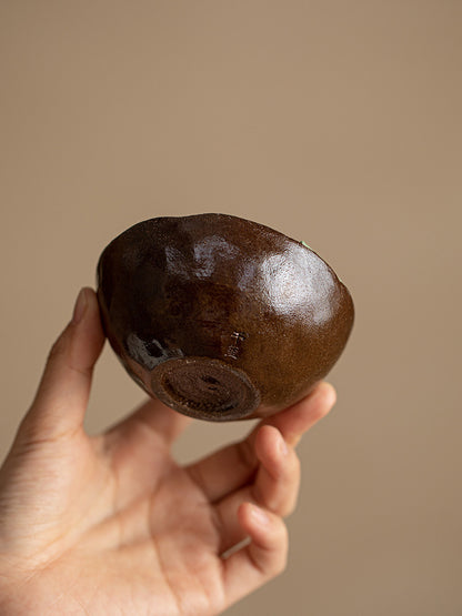 Base view of the handmade wood-fired ceramic lotus tea cup