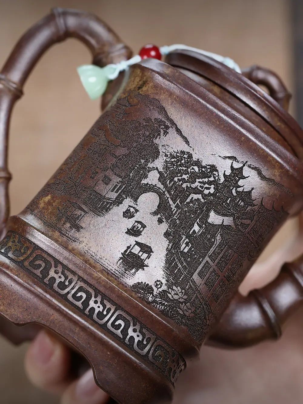 Close-up of another carved water-town panel on the square Yixing zisha teapot