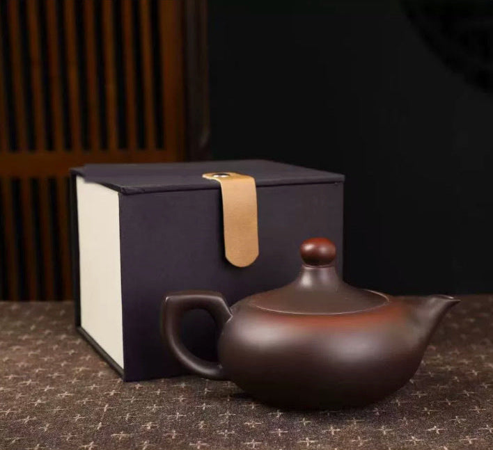 Fengming Zisha teapot shown with a sample random gift box
