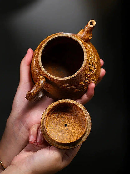 Open Shi Piao zisha teapot showing the interior and removable lid