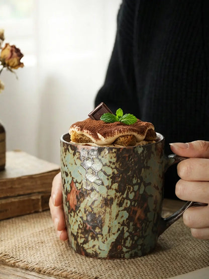 Mint Green reactive glaze ceramic mug holding dessert in a casual table setting
