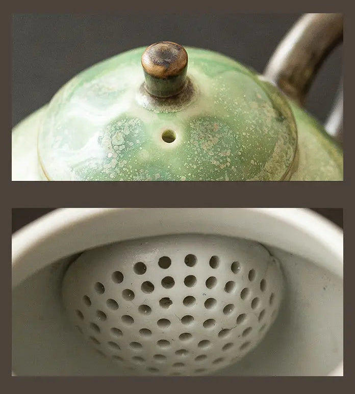 Close-up of the teapot lid knob, vent hole, and built-in multi-hole filter
