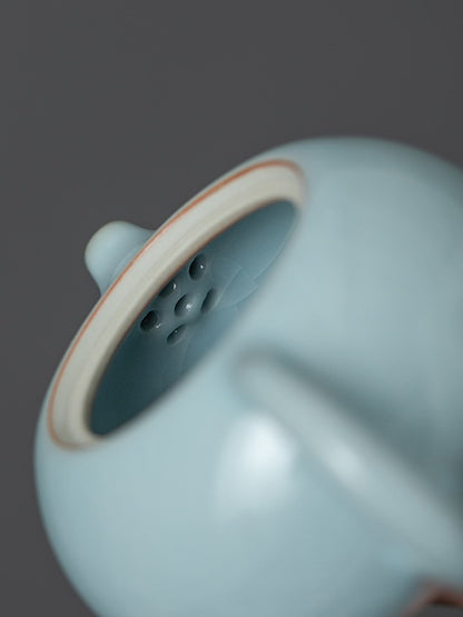 Close-up of the built-in multi-hole filter inside the Xishi ceramic teapot