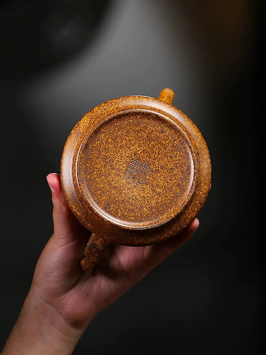 Base of the Shi Piao zisha teapot showing an impressed seal mark