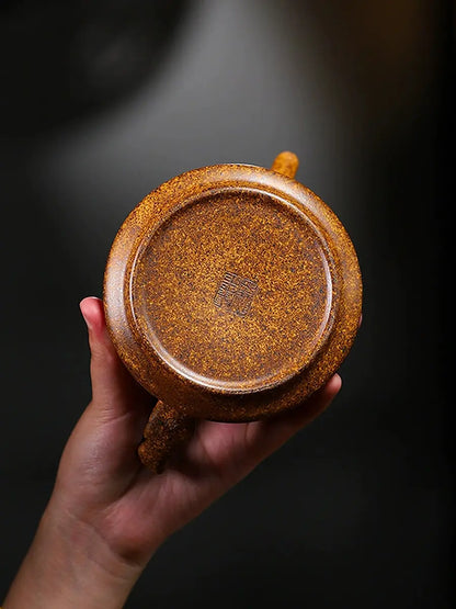 Base of the Shi Piao zisha teapot showing an impressed seal mark