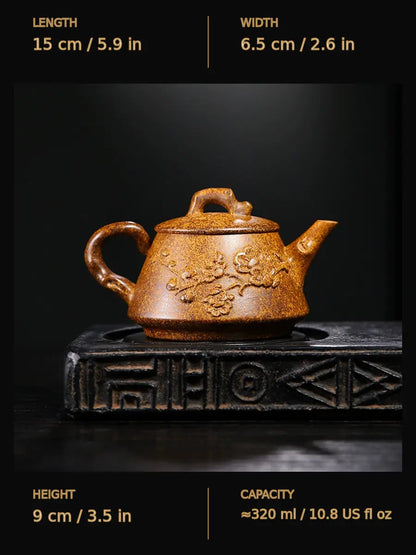 Dimensions of the plum blossom Shi Piao zisha teapot: 15 cm long, 6.5 cm wide, 9 cm high and approximately 320 ml