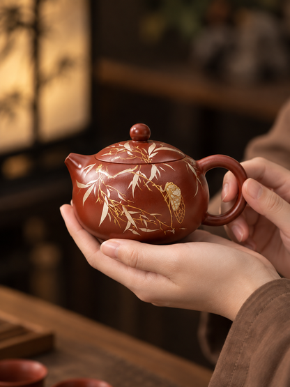 Yixing zisha Xishi teapot with bamboo and golden cicada motif